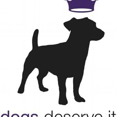 Dogs Deserve It color logo